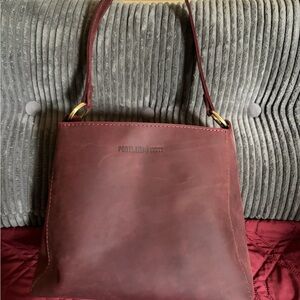 Portland Leather Maroon Triangle Shoulder Bag